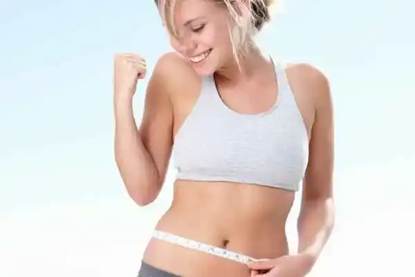 Unraveling the Mystery: Where Does the Body Fat Loss From First? 3 Image of woman happy with fat loss Hampshire