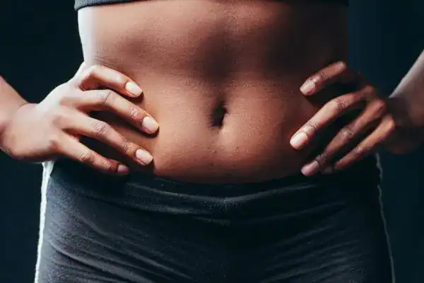 Toning Your Stomach: The Ultimate Guide to Achieving a Sculpted Stomach While Shedding Pounds 1 Image of a toned stomach after non surgical treatment Hampshire